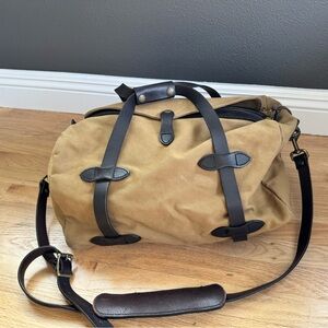Filson Tan Duffel Bag with Black Straps